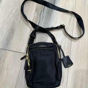Tumi Black and Gold Messenger Bag